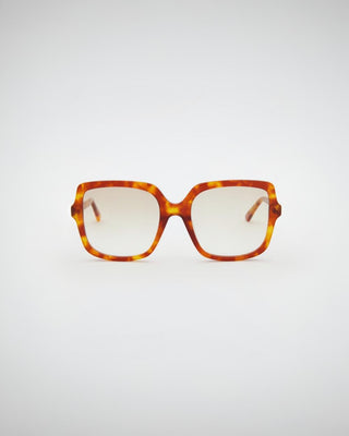 Elara Milky Brown Tinted