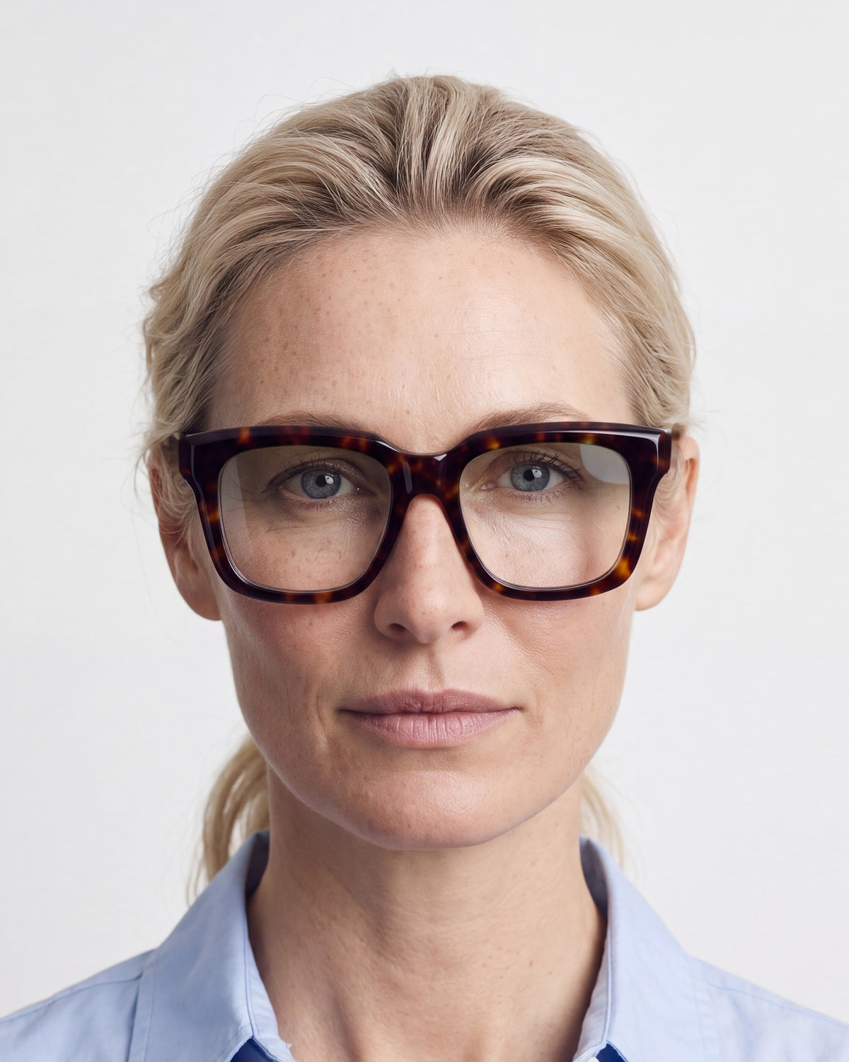 Therese in tortoiseshell, worn, Sage lenses