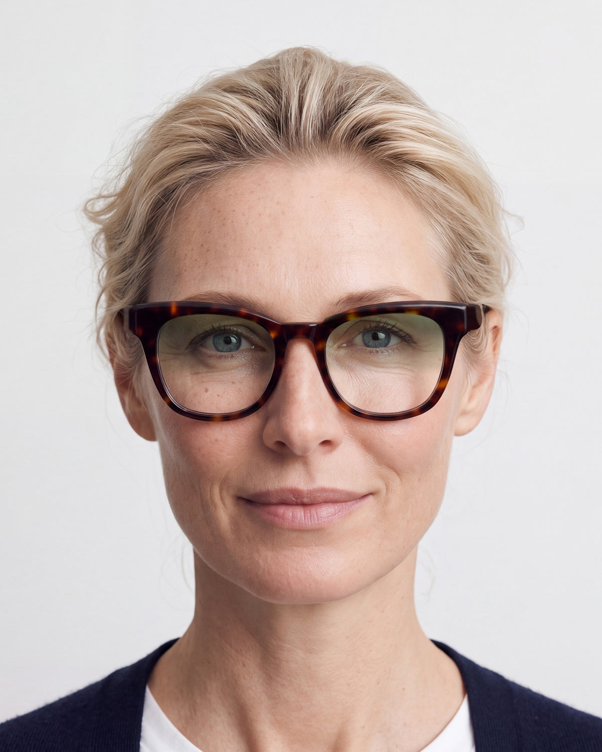 Zoey in tortoiseshell, worn, Sage lenses